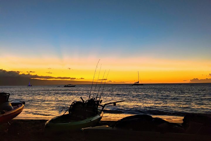 a sunset over a body of water
